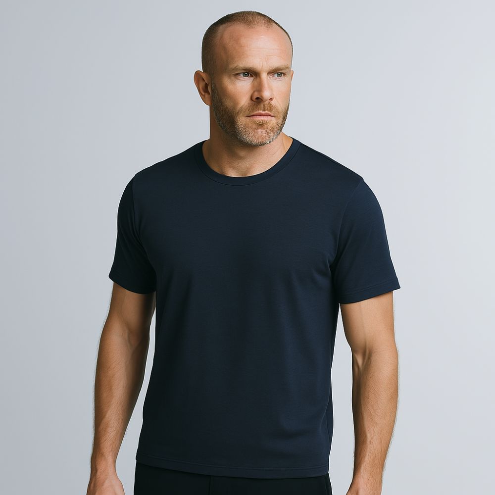 Male model wearing navy Fioranzo Tech T-Shirt – breathable, fitted shirt with minimalist cut and anti-odour tech